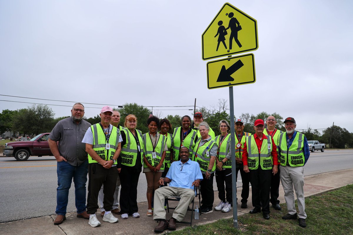 BeltonISD's tweet photo. For more than 19 years, Leonard Harris has been the familiar face helping students safely cross at Leon Heights Elementary. Today, we dedicated the Leonard Harris Crosswalk in honor of his service, care and commitment to our students and families.🚸 #CelebrateBISD🍎 https://t.co/ylrzSTvcRK