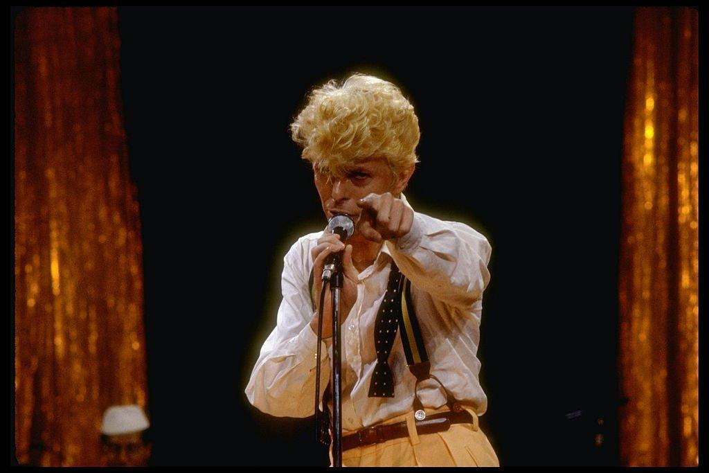 TheDustinFitz's tweet photo. Today in 1983, David Bowie hit #1 on the Billboard Hot 100 with "Let's Dance." Written by Bowie and co-produced with Nile Rogers, it became the biggest selling single of his career. https://t.co/viBphsjBtz