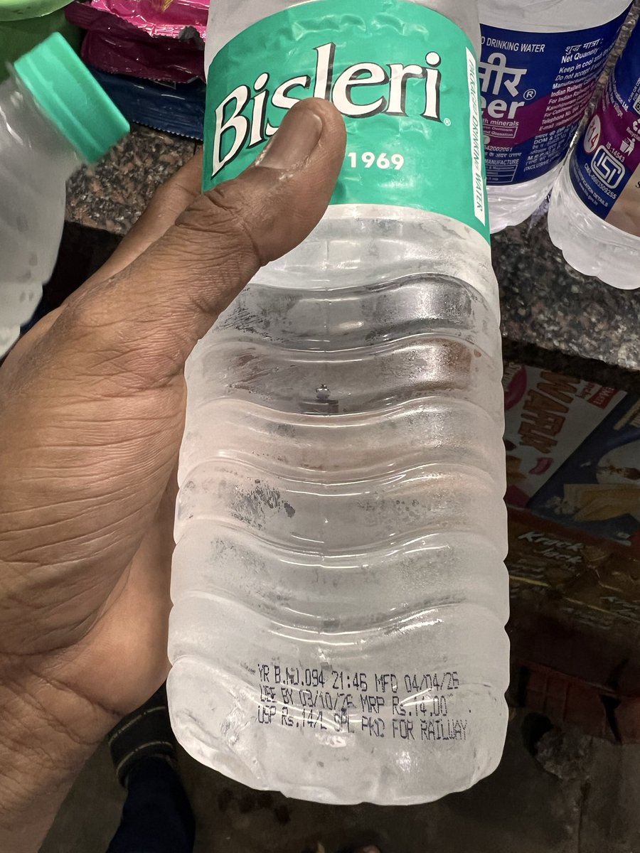 ashishstjain's tweet photo. Bought Bisleri water at Renigunta Railway Station (Platform 5) for ₹20, when MRP is clearly ₹14! Vendor refused to correct despite pointing it out. Overcharging passengers on platforms? @RailMinIndia @IRCTCofficial- #RailwayOvercharging @AshwiniVaishnaw https://t.co/nbHaDS5ZPU