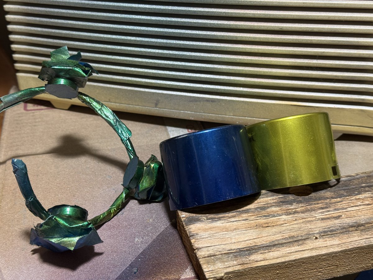 One of the first metal things I painted, and I checked to see if the metal needed scuffing. I read it wrong. So normal handling is knocking off paint chips. I stripped the LED holder and started over. Didn't have green, but these two colors made green. Scuffed and primed.