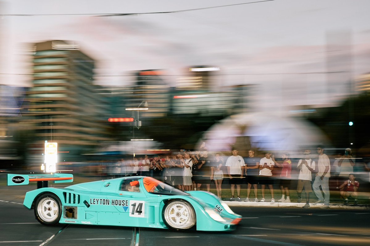 AdelMotorsFest's tweet image. A Le Mans sportscar classic (Porsche 962C) being driven by a Formula 1 race winner (Thierry Boutsen) through the city streets of Adelaide. Things you only see at the Adelaide Motorsport Festival Gouger Street Party. #AMF #Adelaide #LeMans #F1