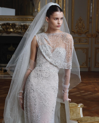 fashiontempoco's tweet photo. The "Minimalist" era is officially over. 🕊️✨

The @ElieSaabWorld   Bridal Spring 2027 collection just redefined "Individualist Maximalism." 
From sculptural Basque waists to 3D floral art—this is the new standard for bridal couture
#ElieSaab #Bridal2027 #FashionTempo #Couture https://t.co/I1p8dI1Zfn