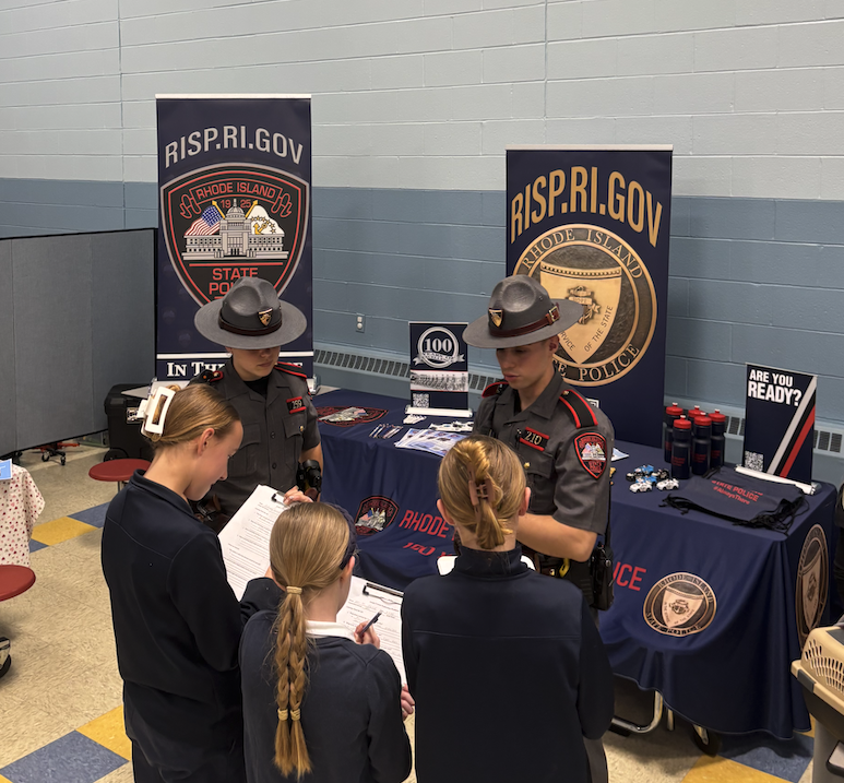 RIStatePolice's tweet photo. Earlier today Troopers participated in the annual Monsignor Clark School Career Fair in Wakefield.  This event was a valuable opportunity for the students to meet members of our agency and learn about different career paths with the State Police. #AlwaysThere https://t.co/0Rp4T9hiWS