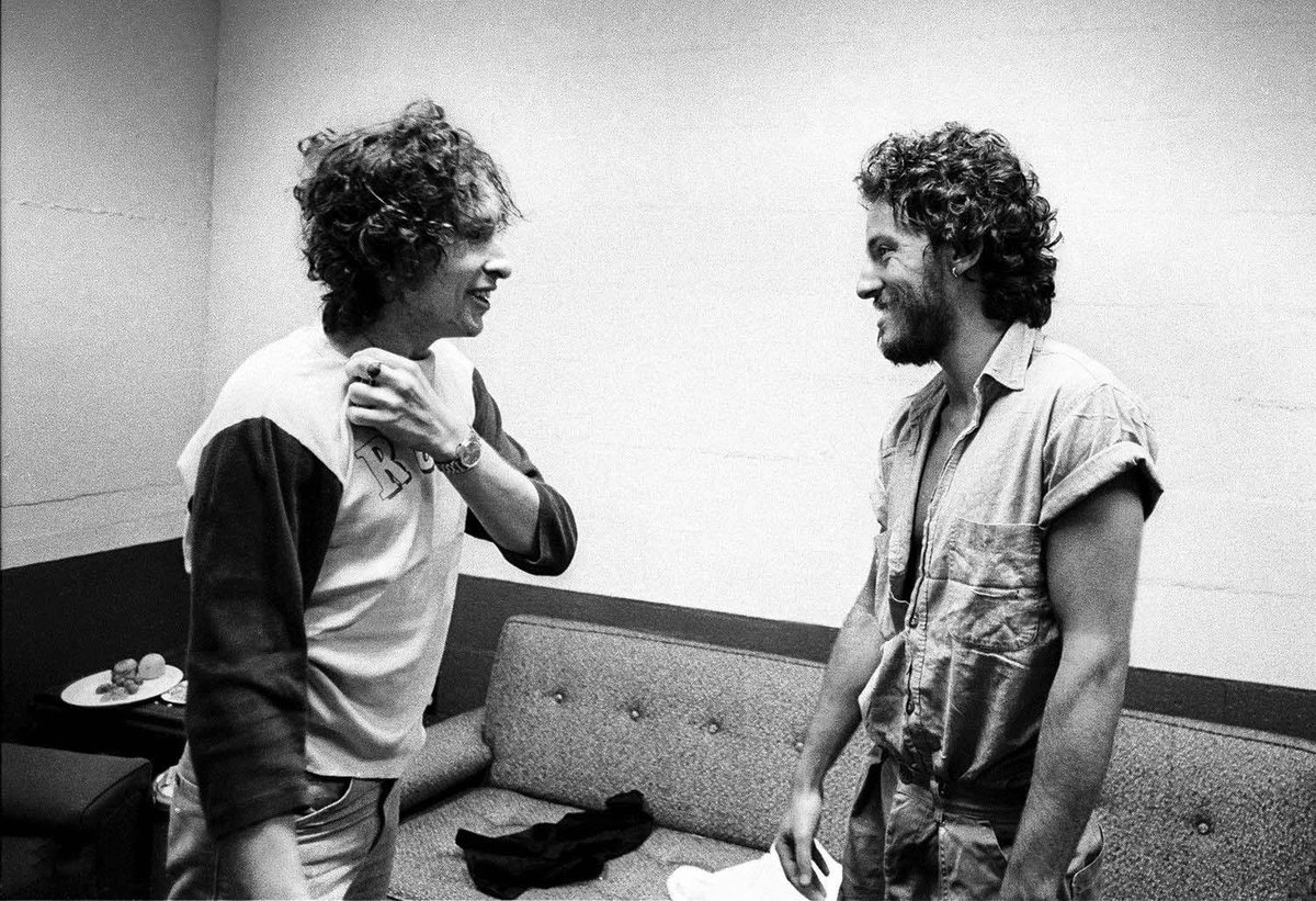 If I had a photo taken of me with Bob Dylan when I was 25 and my hair looked like this good I would show it off every day of my life.