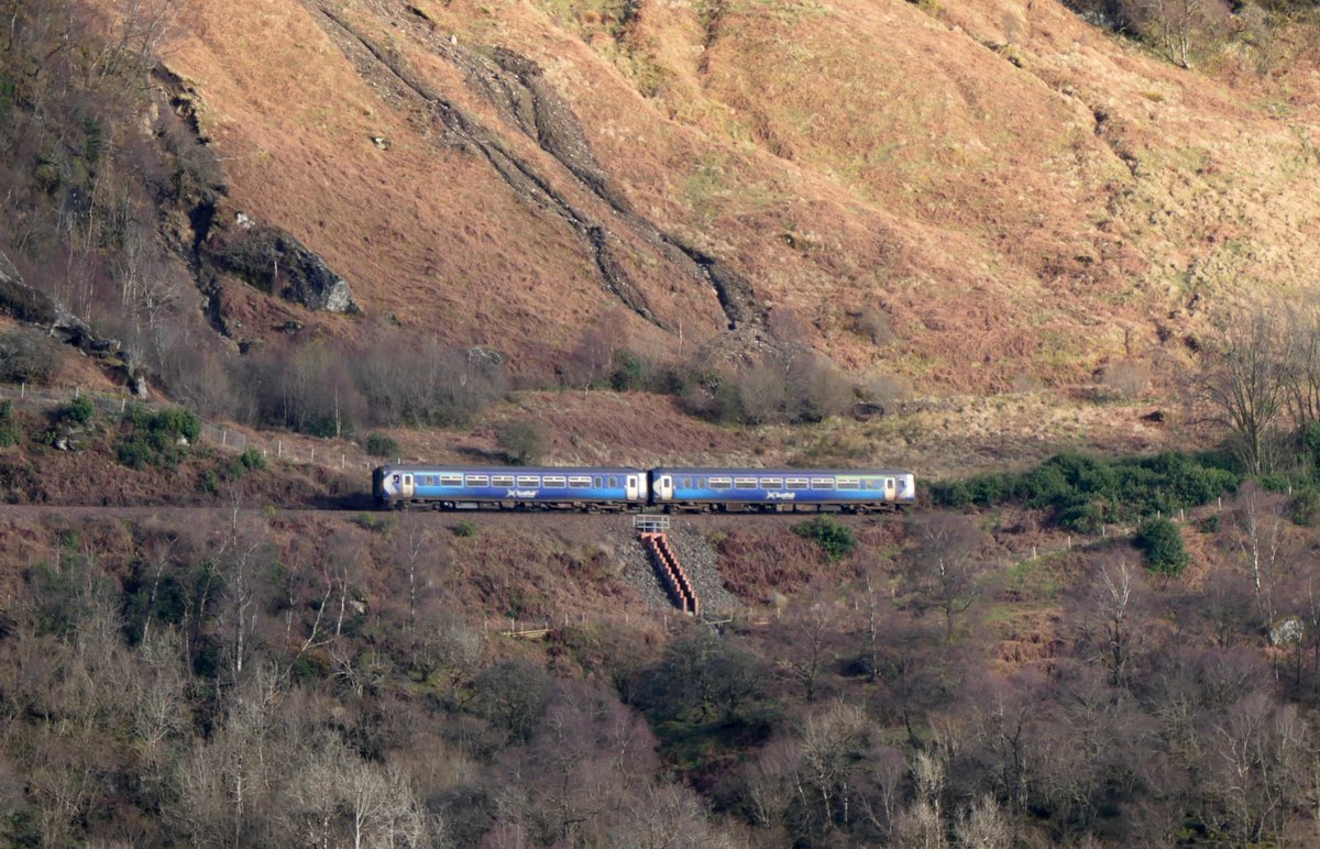 Scotrail Saltire liveried 156493 makes its way along the hillside high  above Loch Long at Ardgarten, south of Arrochar with 1Y26 16.11 Oban -  Glasgow Queen Street service 5.4.26 scottishtrains.zenfolio.com/p604331348/e53…