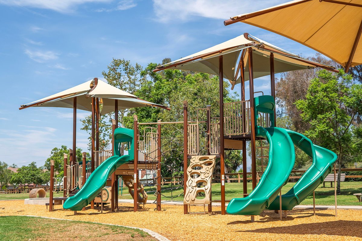 PlayRelaxLive's tweet photo. Discover a new level of play at Gallup Park! This refreshed community hub at Nellie Gail Ranch in California offers separate zones for younger and older kids, dynamic play elements, and exciting features like a 75-foot zip line and shaded swings. https://t.co/qJwH373nhd