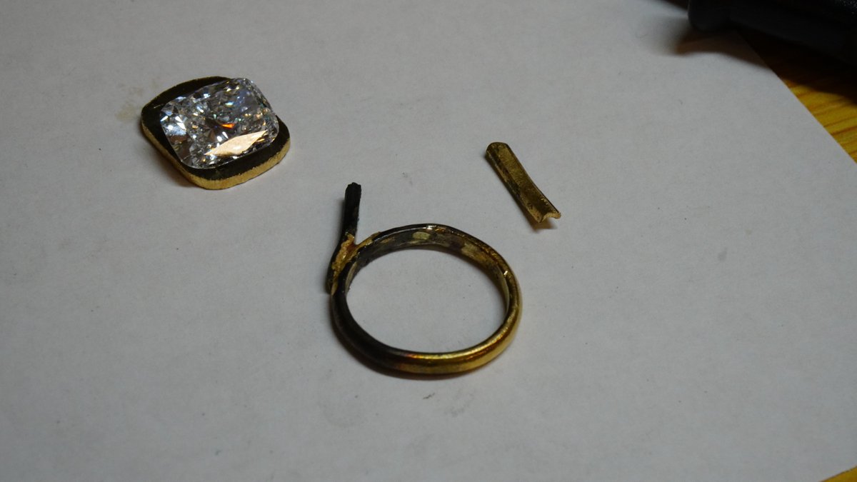paulcjh's tweet photo. Originally I wanted a halo with small 1.5mm diamonds (melee diamonds) but after 5 attempts I couldn't set them properly as I couldn't get a small vibrating chisel that you normally need. Dremel was way to inaccurate.

I got some 18kt gold solder paste which melts at a lower temp than regular gold. Bit more bending and cutting and you can start to put pieces together. Just a blow torch and some patience.

I opted for a smaller inner/under halo that I then set the main stone on.

Everything looks trash until you start to file + polish then gaps and rough edges start to go.