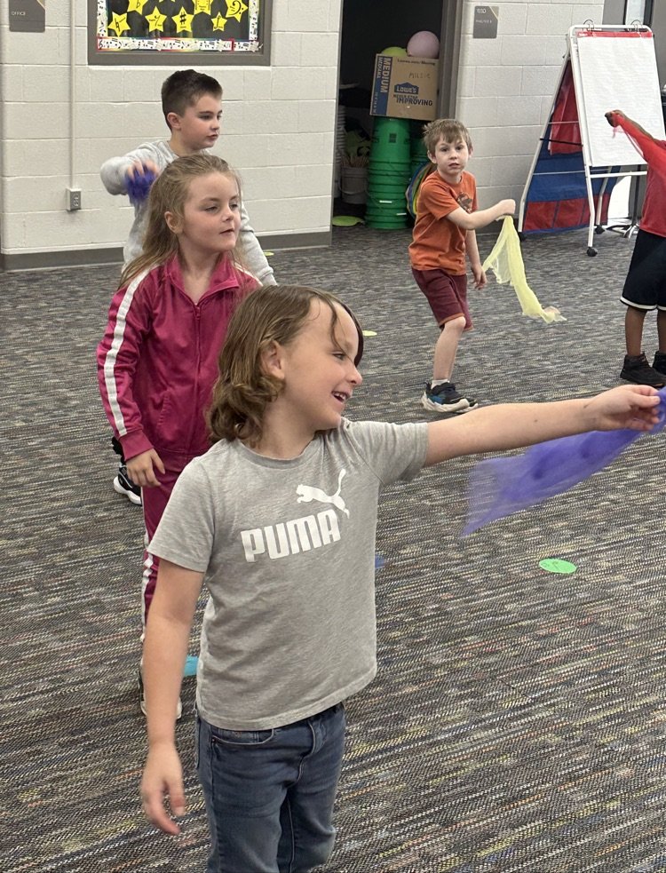 AMESTigers's tweet photo. We loved spending time in music class with Mrs. L and  Miss Benson’s Kindergarten class. Students were singing, dancing, following directions, and expressing themselves through movement with scarves. The smiles on their faces say it all! 😀 https://t.co/KTYbdaVbmZ