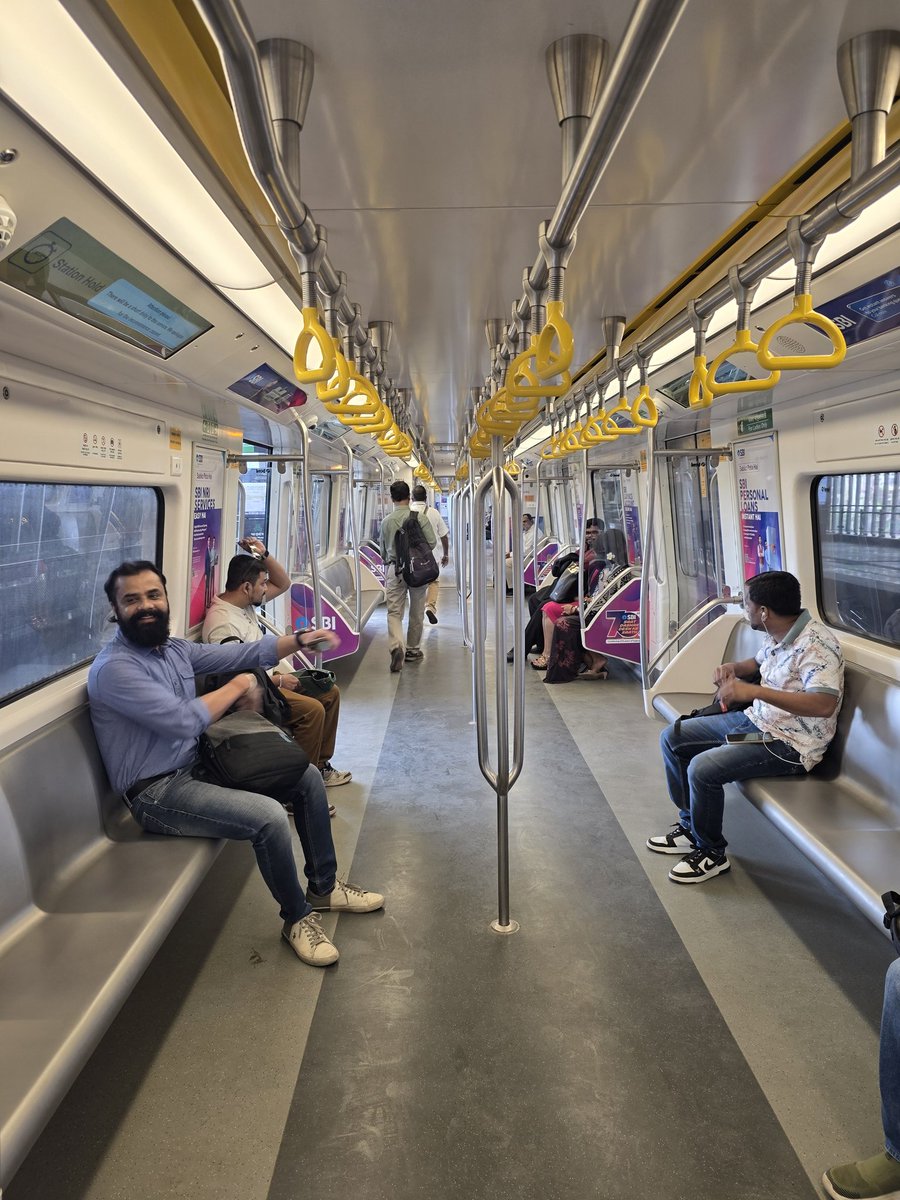 Farazk3's tweet photo. Such happy faces! Can't believe you can get a seat from Kashigaon - Mira Road and travel towards Andheri during morning peak hours, @MMRDAOfficial. Thank you for this gift. #mumbaimetro https://t.co/6gw4wLa3jt