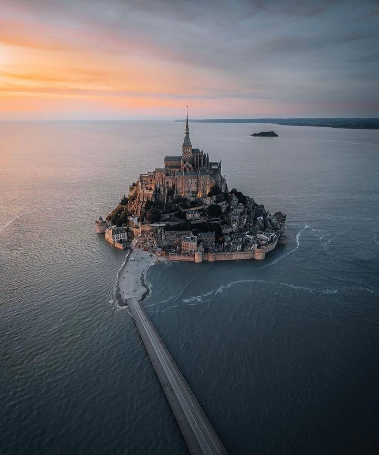 TravelDolce's tweet image. Straight out of a movie.

#MontSaintMichel #Aerial #France