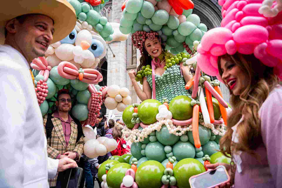 thandojo's tweet image. People take part in the #annual #Easter #Parade and Bonnet #Festival on 5th Avenue outside St. Patrick's Cathedral in #NewYorkCity