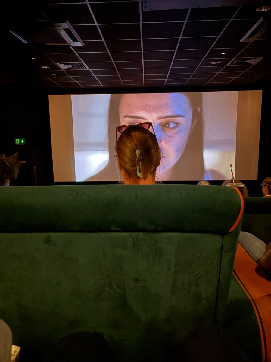 After walking out the cinema the lady was in fact over 6ft. Ok Goliath