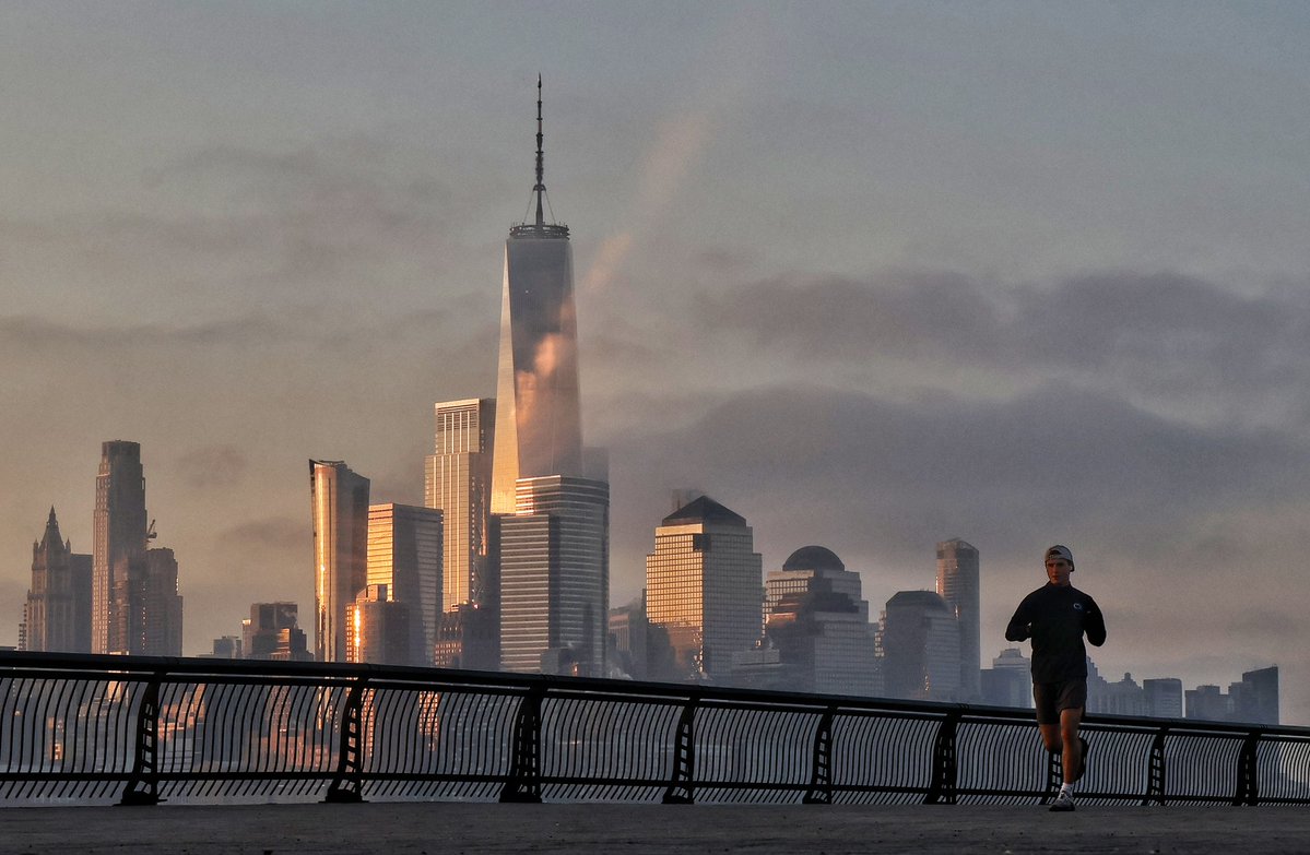 GaryHershorn's tweet image. Soft light as the sun rises in New York City, seen from Hoboken, NJ, Friday morning #newyorkcity #nyc #newyork #sunrise @empirestatebldg