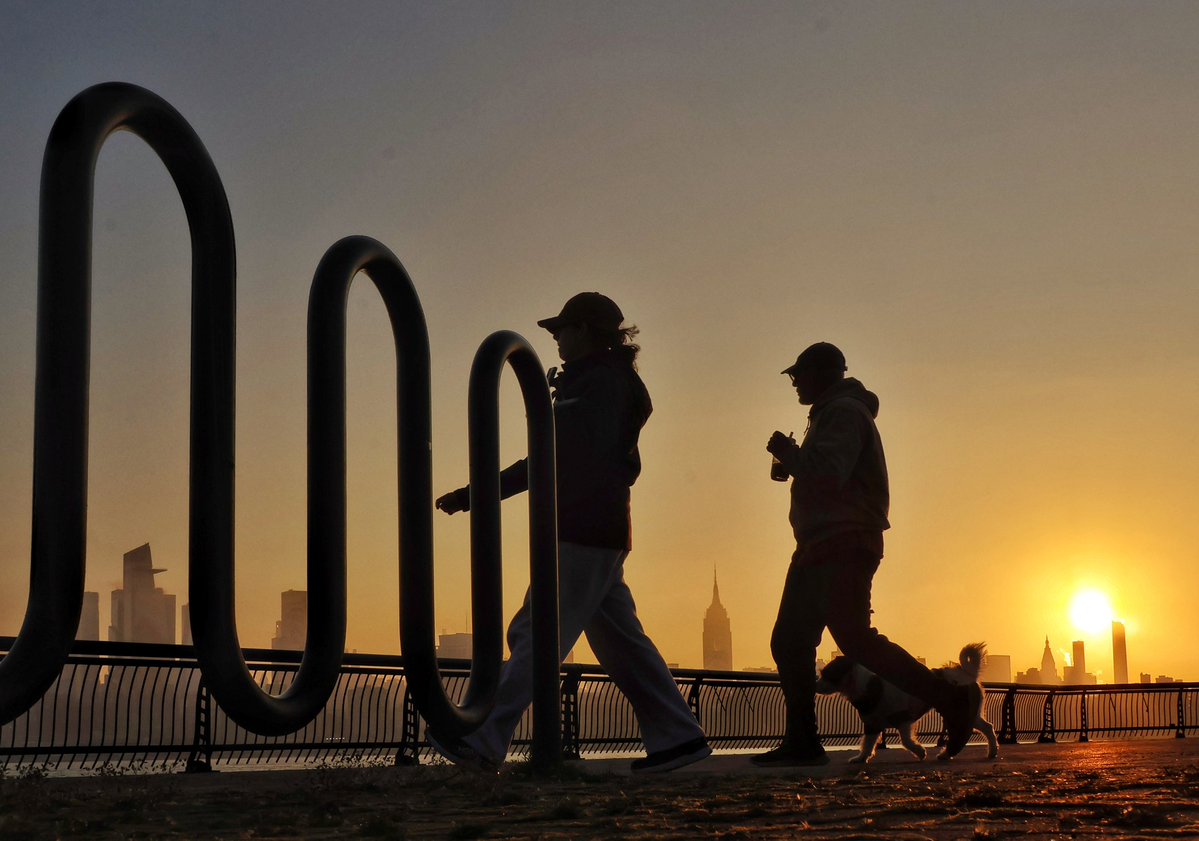 GaryHershorn's tweet image. Soft light as the sun rises in New York City, seen from Hoboken, NJ, Friday morning #newyorkcity #nyc #newyork #sunrise @empirestatebldg