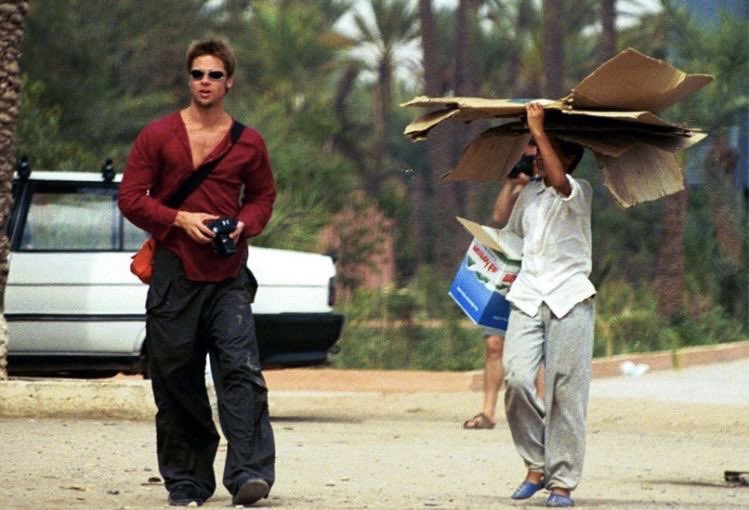 rachcorrine's tweet photo. Going down a Brad rabbit hole. The OG cool guy. The cross body bag. The sunglasses. The pants. The camera. Gg. https://t.co/t7tIA67OJH