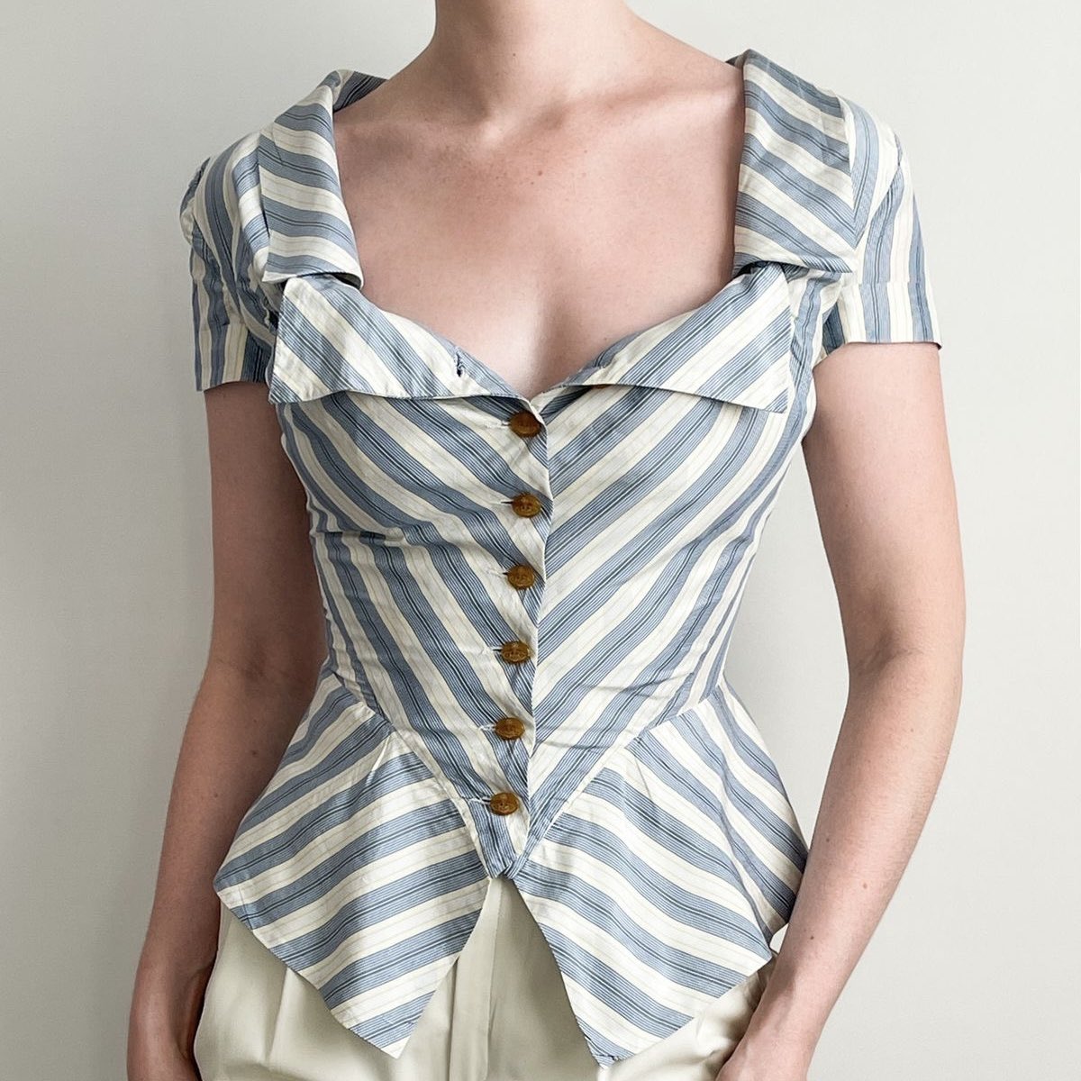 thevwarchives's tweet photo. Vivienne Westwood knew what she was doing with this neckline https://t.co/V9Ki1L7QLb