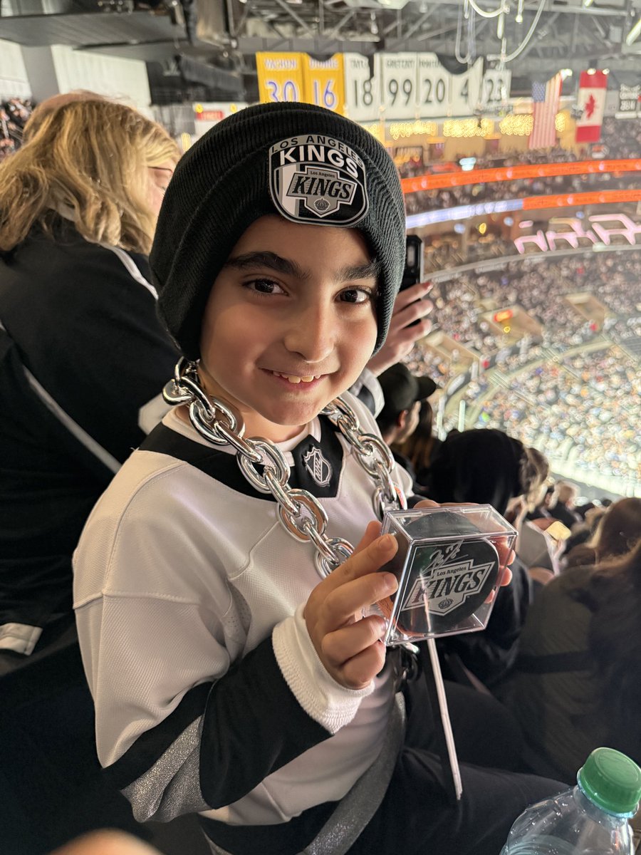 LAKBC's tweet photo. Artin won this Quinton Byfield puck. Please stop by our booth outside section 317 for your chance to win a signed puck and play the chip game. #GoKingsGo #LetsGoKings https://t.co/X06oYmhgBF