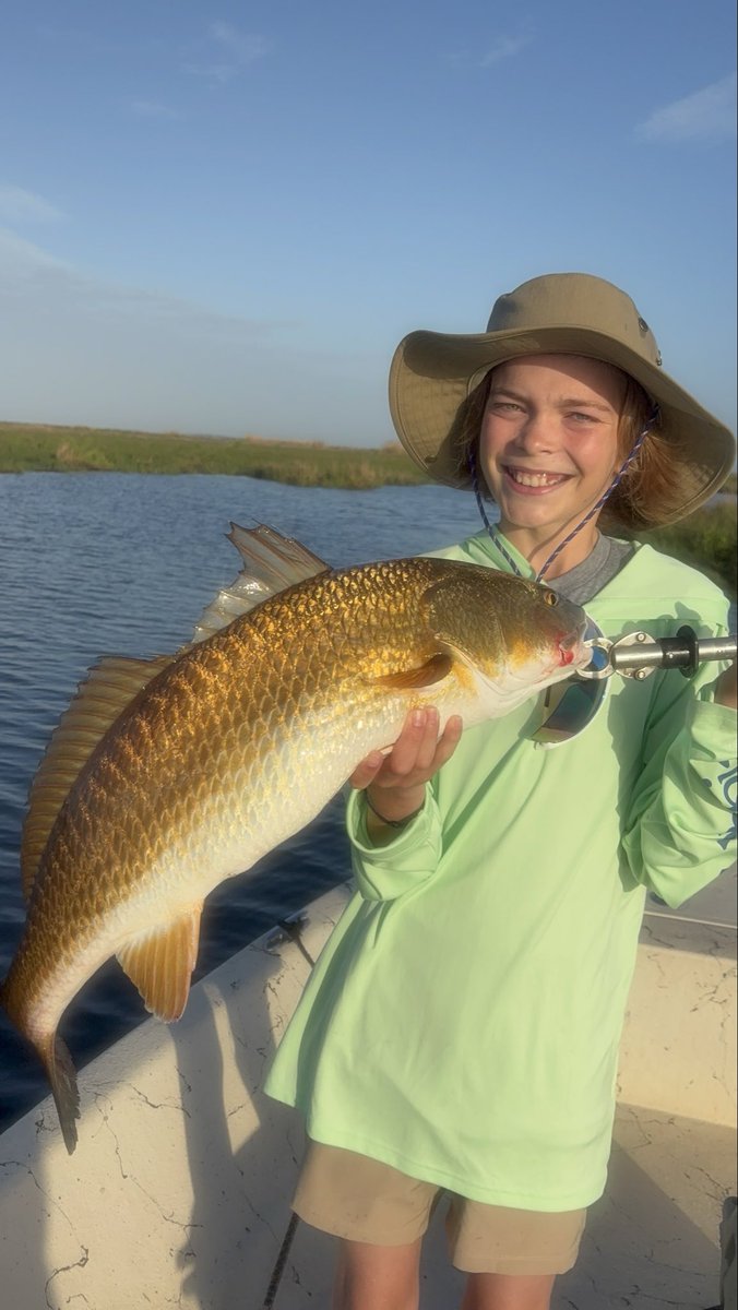 dufrenesguide's tweet photo. Shane Guidry and her son Jennings from New Orleans had a ball this am chasing redfish this am. They got their limits of reds and released 6 oversize reds. #MinnKota 
#Humminbird  
#Raptor
#OPTIMAbatteries
#BomberLures #PennFishing
@MinnKota
@humminbird
#MajekBoats
#OPTIMABattery https://t.co/bj1HBcLnC5