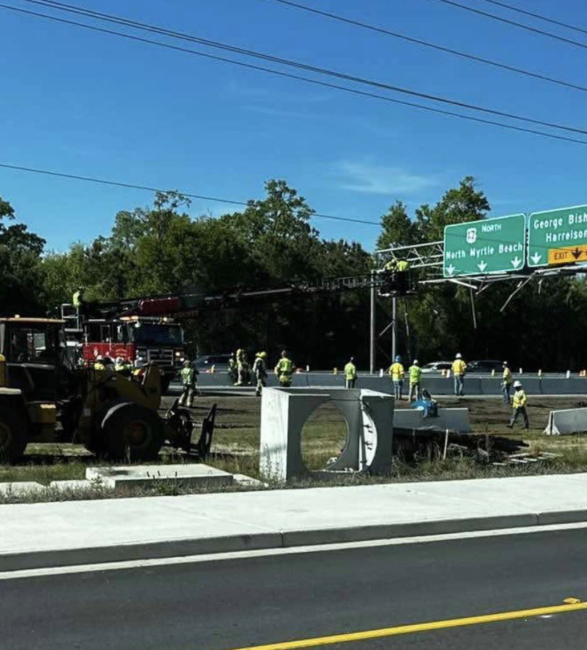 AlexDepartment's tweet photo. TRAFFIC ALERT: US-17 in Myrtle Beach is SHUT DOWN to a truck hit the overhead signs. Our Fire Department is working on scene. Please Avoid the area. https://t.co/1yDxmwXU2q