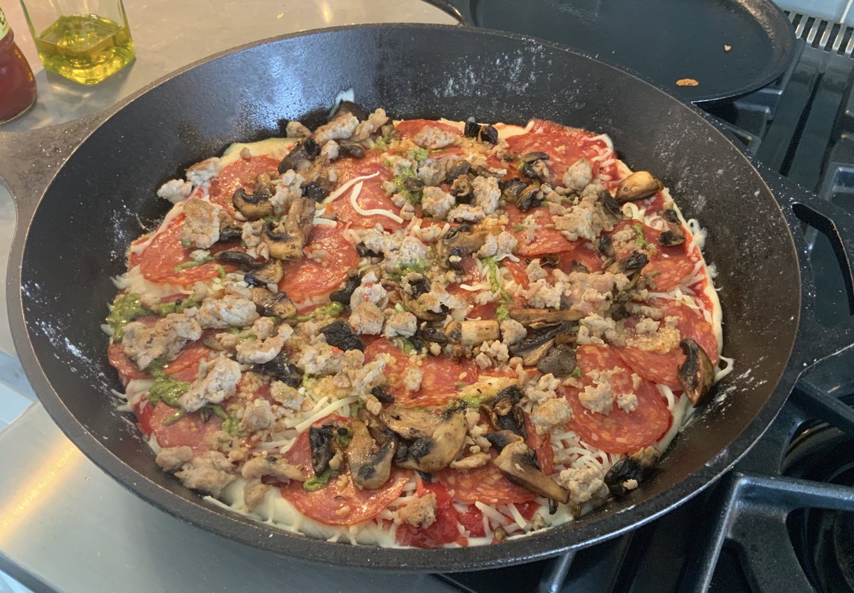 KellogCreek's tweet photo. Japanese people

Today for lunch I made Frying Pan Pizza in a huge cast iron skillet. I heat my oven to 400 degrees F and get started prepping all the ingredients. Most important is good sauce (I use Rao’s), grated mozzarella, Parmesan, pepperoni, Italian sausage, mushrooms, olives, crushed garlic, and peppers. The pizza dough is store bought. 

Anyway, you get your pan hot on the stove top, like from a medium low heat and add olive oil and corn meal in the bottom. In goes the pizza dough sized up just right so you can fold the edges over a bit. Then you add the sauce, not too much, a thin layer is good. The  two cheezes and all your toppings go on next. Be careful the flame under the pan is not too hot. You want a crisp bottom not a burned bottom. 

Then into the oven you go for 20 minutes or so. You can add chopped basil at the end and pepper flakes. I didn’t have any fresh basil today. It is what it is. The pan is really hot. So be careful removing the Pizza. I have a monster spatula and a Pizza Peel (paddle) so I am golden. You might need help from a friend to tip the pan while you slide the Pizza out. Leave a towel or an oven mitt on the handle of the pan so everyone knows it is hot and Itadakimasu!