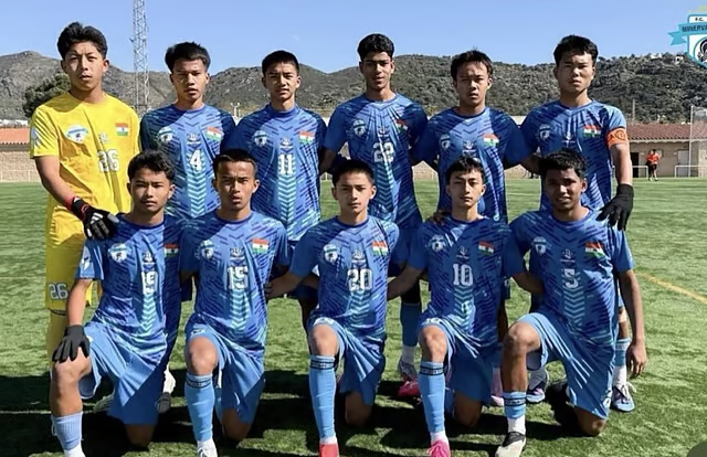 QmVirtual's tweet photo. Recently India's Minerva Academy FC U-15 team achieved a historic 6-0 win at the Mediterranean International Cup in Spain. The Punjab-based side dominated with goals from Raj Singh (hat-trick), Md. Azam Khan (brace), and Lisham Singh. Against which team? #quiz #soccer #fifa https://t.co/W1EPuwq9Ui