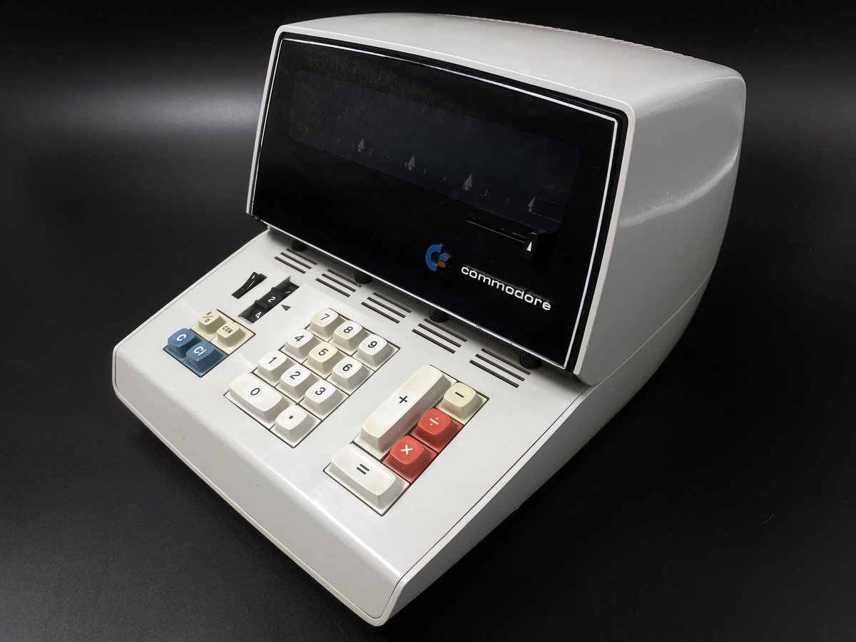 commodoreihs's tweet photo. Here’s a Commodore 412 electronic calculator, introduced in September 1970. Commodore had entered the electronic calculator market just a couple years earlier, in 1968, with the Commodore 500e (I shared photos of that one before). The 500e was actually a re-branded Casio 101e and marked Commodore’s shift from electro-mechanical adding machines into electronic calculators. It was built entirely with discrete logic.
Commodore’s first calculator to use LSI chips came right around the same time with the AL-1000, also sourced from Casio. The 412 shown here also used LSI logic chips, and it’s interesting because it shows Commodore wasn’t tied to any single manufacturing partner.
Prior to the 412 OEM deal, Commodore already had an established relationship with Ricoh in Japan. Commodore’s initial push into mechanical adding machines came in 1959 through the West German company Willy Feiler Zahl-Und Rechenwerke GMBH, which translates roughly to "Willy Feiler Counting and Calculating Works Ltd.", which Commodore acquired in May 1964. After a major funding source collapsed in 1965, Commodore was forced to sell off the Feiler assets in 1966, leaving them without their own adding machine manufacturing capability.
To fill the gap, they struck an OEM deal with Ricoh in 1967 and began selling re-branded Ricoh adding machines, starting with the 201 and 202 models. This Commodore 412 is also a re-branded Ricoh unit, the Ricoh 1200D. So just as quickly as Commodore partnered with Casio for electronic calculators in 1968, they circled back to Ricoh by 1970.
Jack Tramiel highlights the 412’s modular design in Commodore's 1970 annual report. You can see it in the photos. Each board can be individually removed, and the alignment slots in the plastic housing suggest it may have been designed to accommodate additional boards for future expansions. Also noteworthy is that Commodore transitioned from the nixie tube displays of their initial Casio models to a Vacuum-Flourescent Display (VFD) with the 412 model. As much as Commodore's computer history fascinates me, it's super cool to see how quickly technology was evolving in these early electronic calculators, and it's amazing that Commodore, a very young company, evolved from purely mechanical adding machines in 1959 to fully electronic calculators only 9 years later in 1968.
