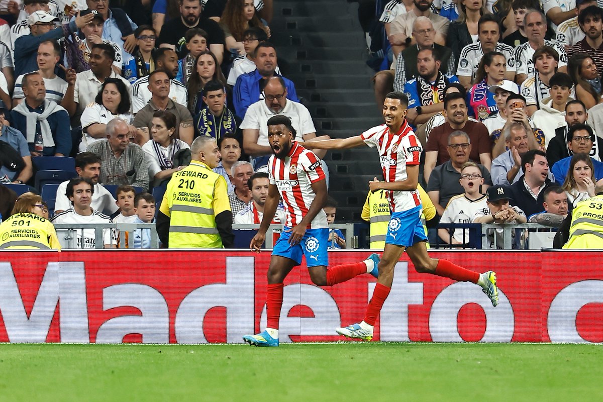 CGTNSportsScene's tweet photo. #RealMadrid’s night:
⚽#Valverde opener (#Gazzaniga howler)
⚽#Lemar banger for 1–1
❌#Mbappe mis-hits a big chance
📊Draw vs 12th-placed #Girona, #Barcelona can go 9 pts clear, and everything now leans on overturning a 2–1 deficit against #Bayern in #Munich.
#LaLiga https://t.co/8YZLEsbYSa