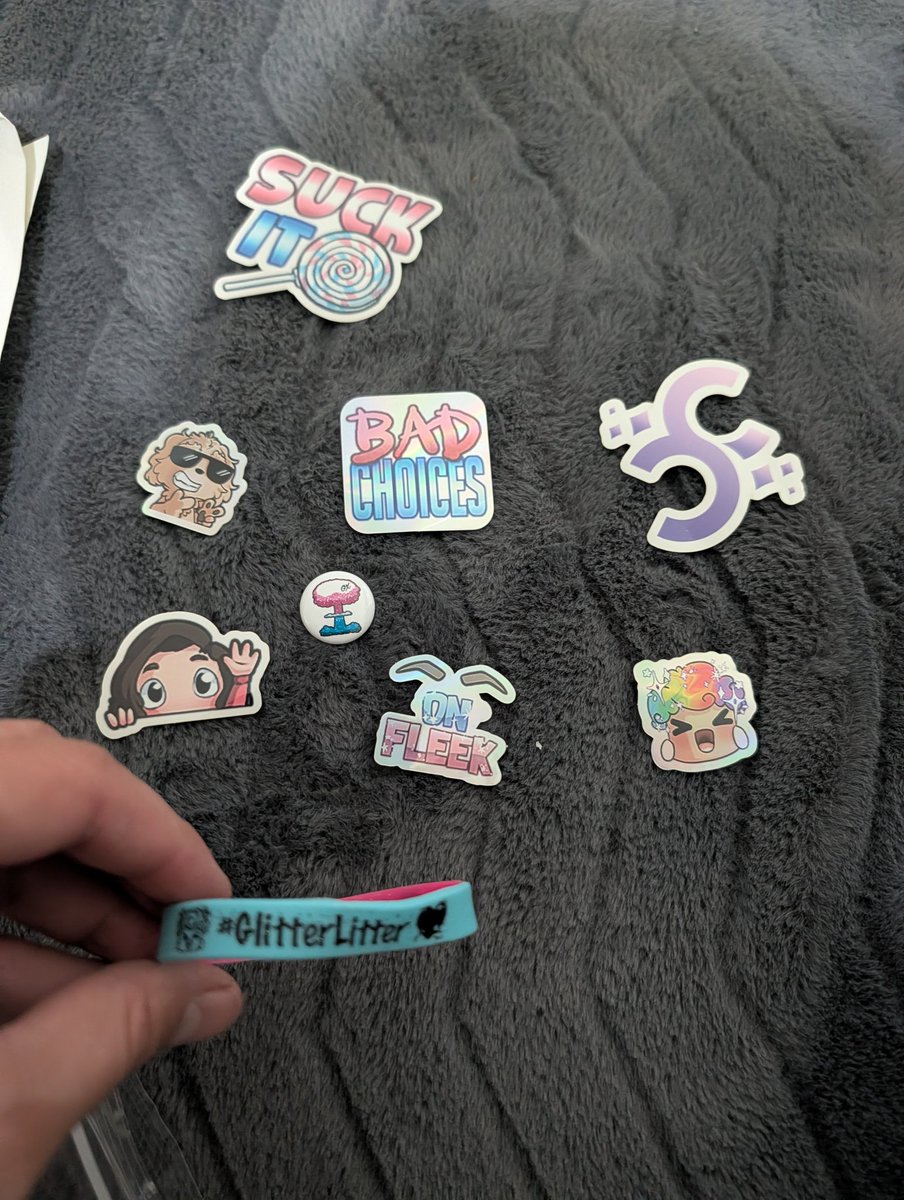 wuzielt's tweet photo. It would be smart of me to add the picture lol @GlitterXplosion sorry just found some of braclets and stuff from twitchcon https://t.co/98AQiYMyi5