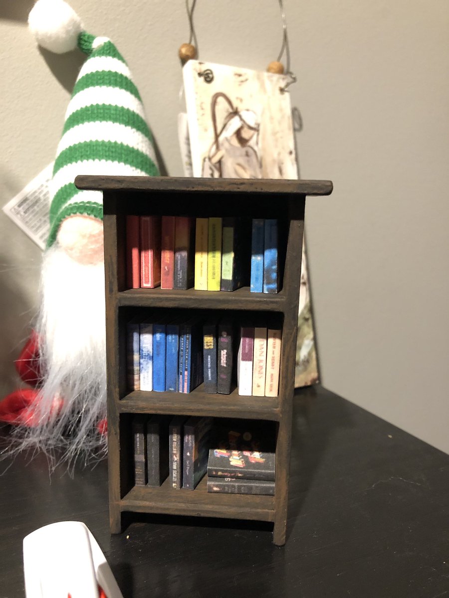 dmerikanto's tweet image. My daughter made minis of all the books I read last year for me for Christmas.