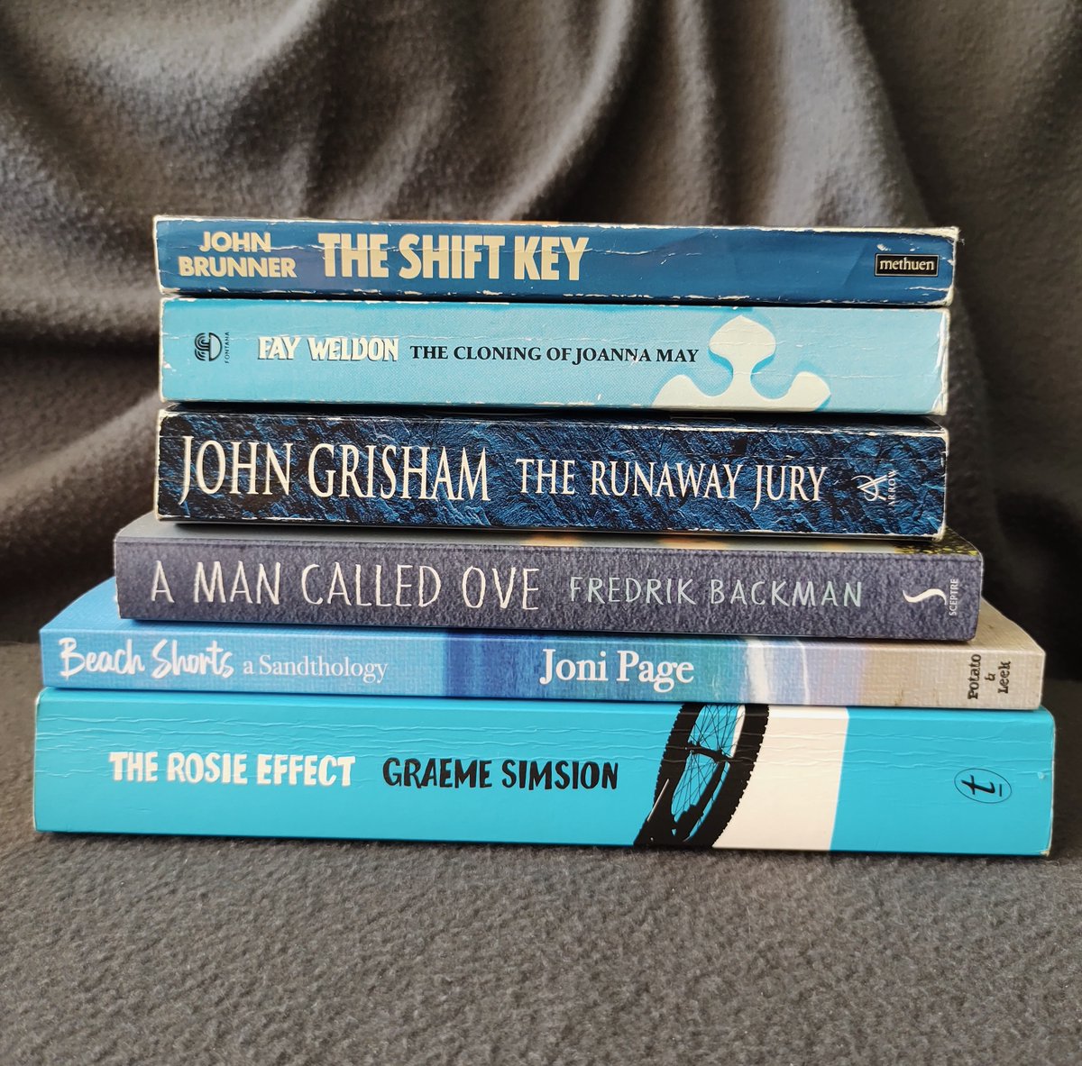 JoniPageAuthor's tweet photo. Blue book stack day!
Good company for the second from the bottom ❤️
#bluestack #bluebooks #shortstories
#beachshortsasandthology https://t.co/wUcYgK6wsU