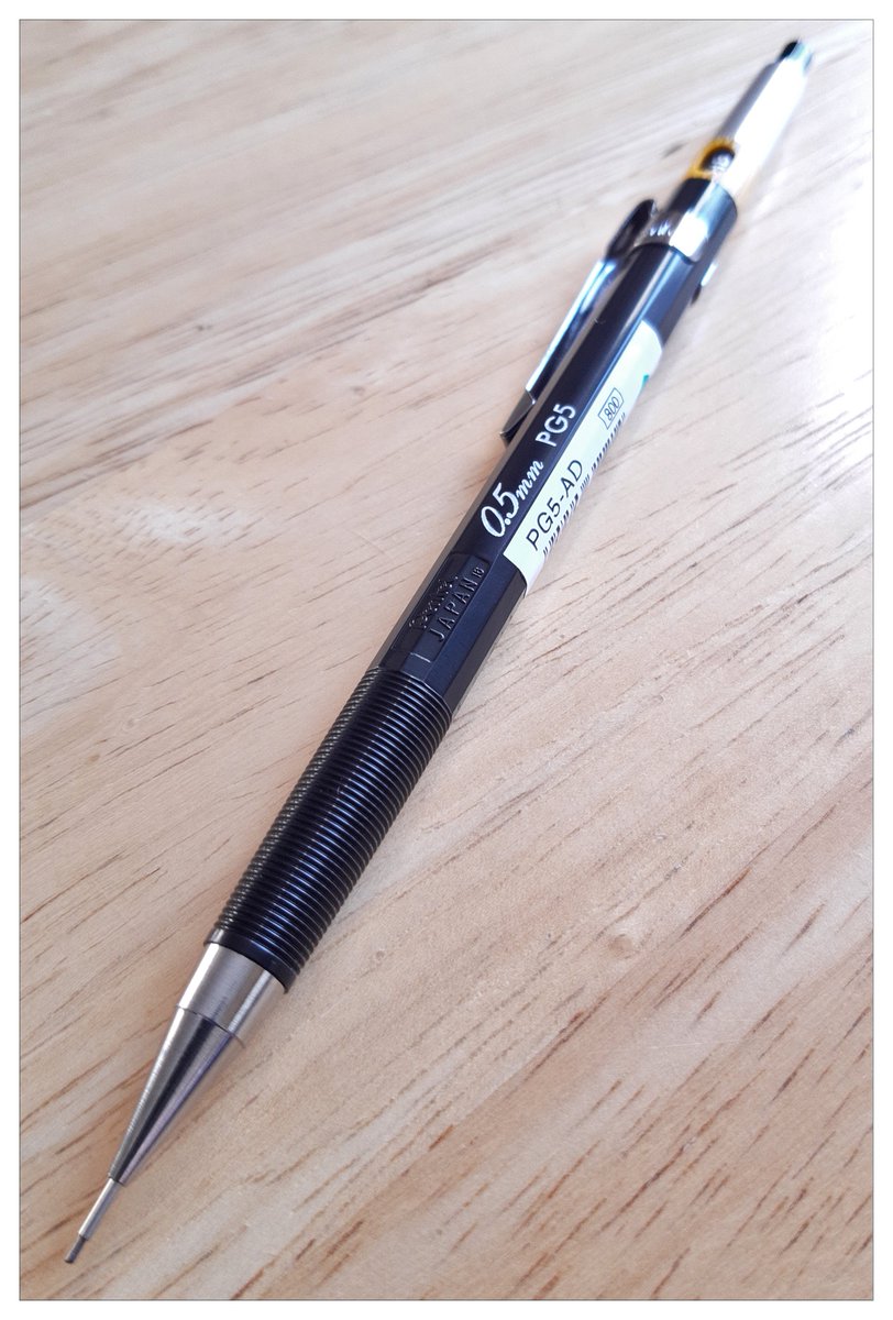 The Pentel PG5 (.5 mm) mechanical pencil has been in production since 1972. The internal parts are made from metal (dispenser and dispenser ring are brass). There is also a lead hardness indicator and cleaning needle. 
-