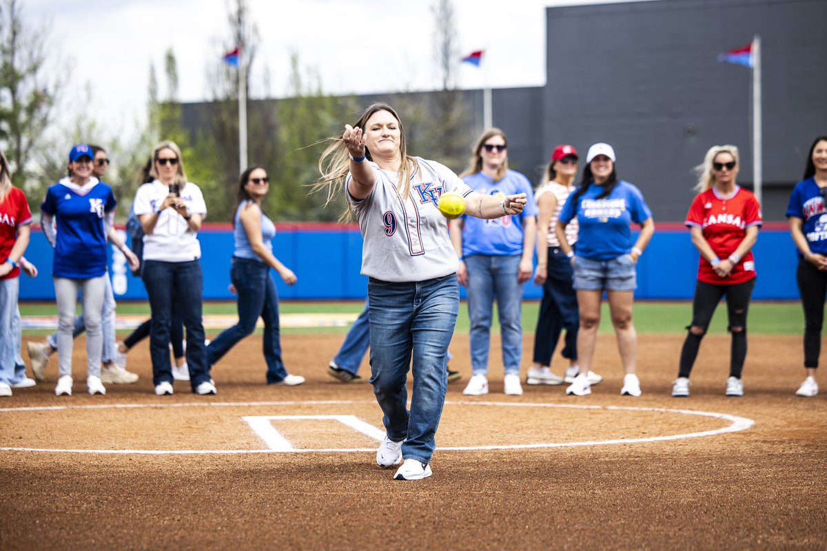 KUSoftball's tweet photo. 2006 Big 12 Champions are in the house ‼️

Another look at our first pitch from Destiny Frankenstein King!

#RockChalk https://t.co/xUGFuwTrOA