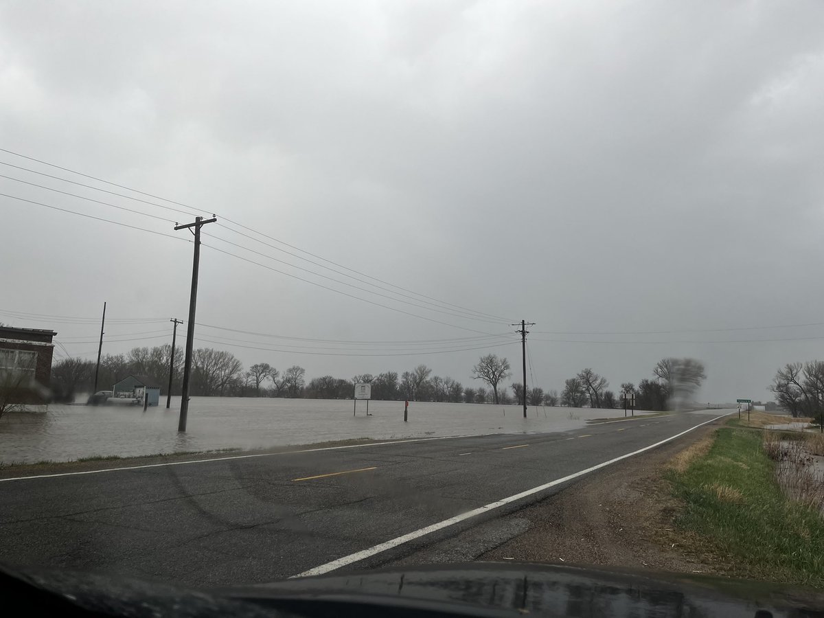 300MphEF5's tweet photo. Substantial flooding in Morrowville, Kansas. Water shout to be covering the road very soon. @NWSTopeka https://t.co/FhDR3F4gGb