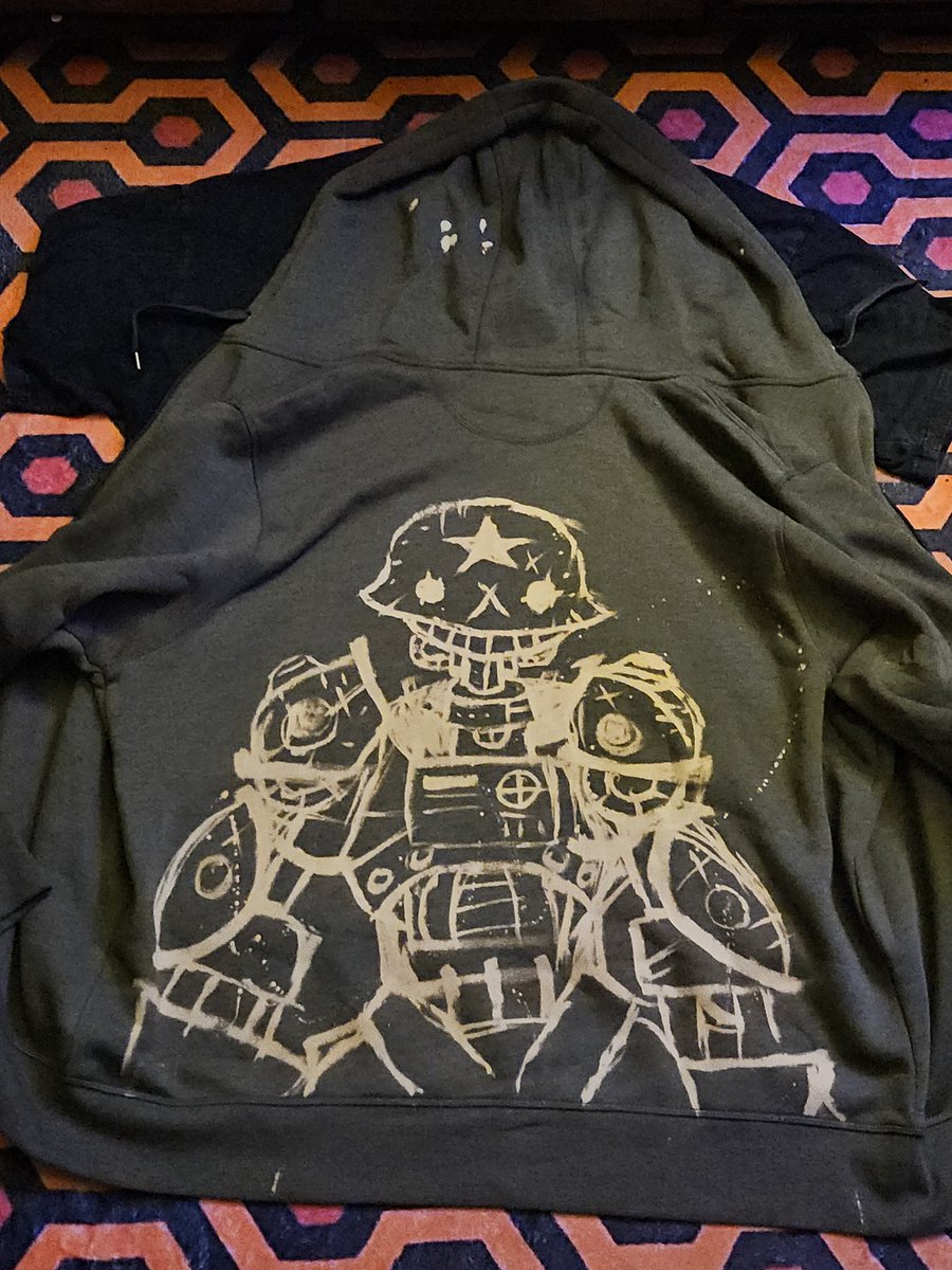 Accidentally spilled some bleach on this hoodie I had and decided to try painting with it