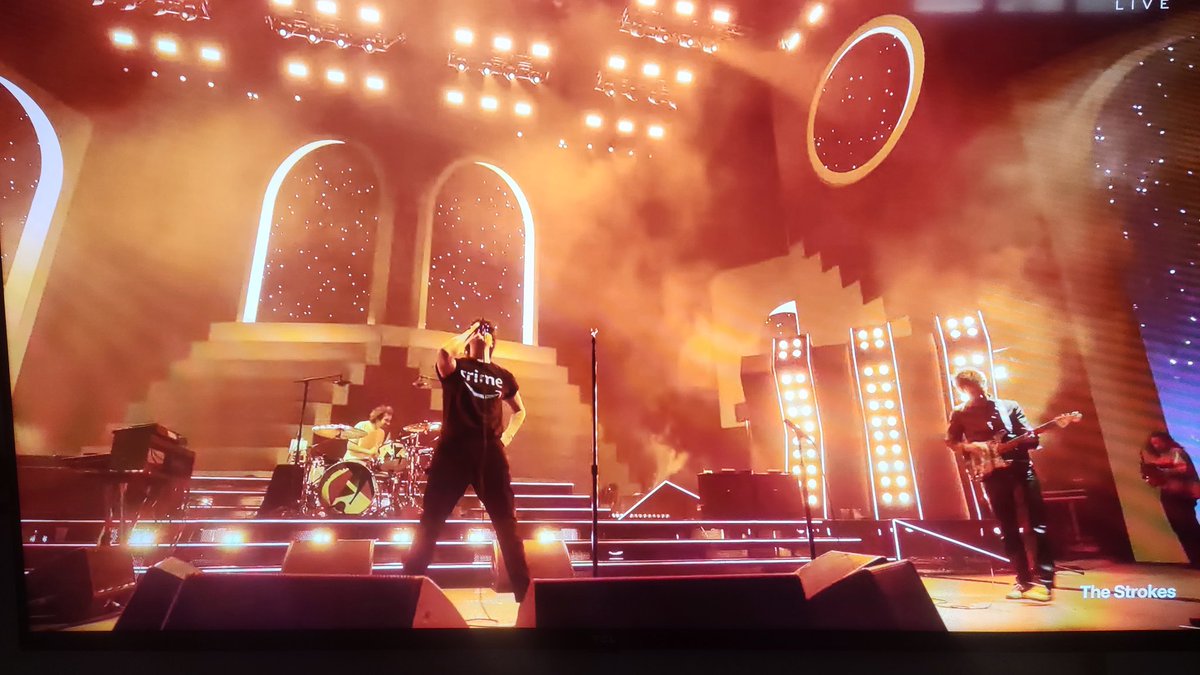 constantane's tweet photo. Julian Casablancas The Strokes wearing "Crime" t-shirt that looks like Amazon logo #coachella
(Amazon is listed by BDS movement) https://t.co/f0J7ILxX5u