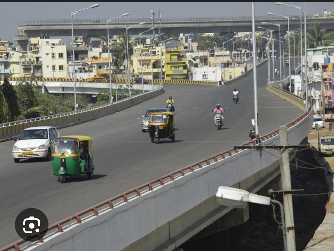 The flyover over the Vrishabhavathi River near Gali Anjaneya Temple on Mysore Road is in poor condition. The surface is uneven, with exposed concrete in several stretches, and the sides are completely covered with mud. Immediate attention is needed.
<a href="/siddaramaiah/">Siddaramaiah</a> 
<a href="/DKShivakumar/">DK Shivakumar</a>