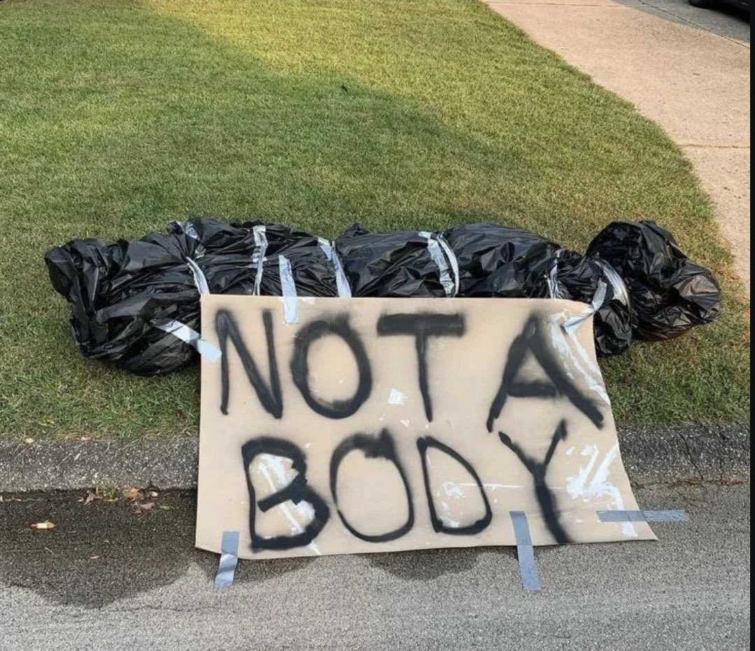 Good one, <a href="/HillaryClinton/">Hillary Clinton</a> and <a href="/BillClinton/">Bill Clinton</a>. 

With your sign, no one will suspect.