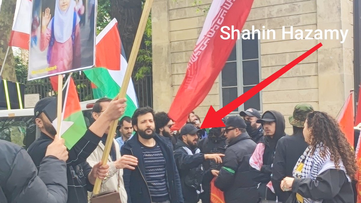 Nopasaran_a's tweet photo. Sans aucune surprise, le cortège pro-régime iranien défile aujourd'hui calmement, sous la direction du militant d'extrême droite Shahin Hazamy, aux côtés des organisations "de gauche" appelant à la manif contre la loi Yadan. https://t.co/Tdreui41ve