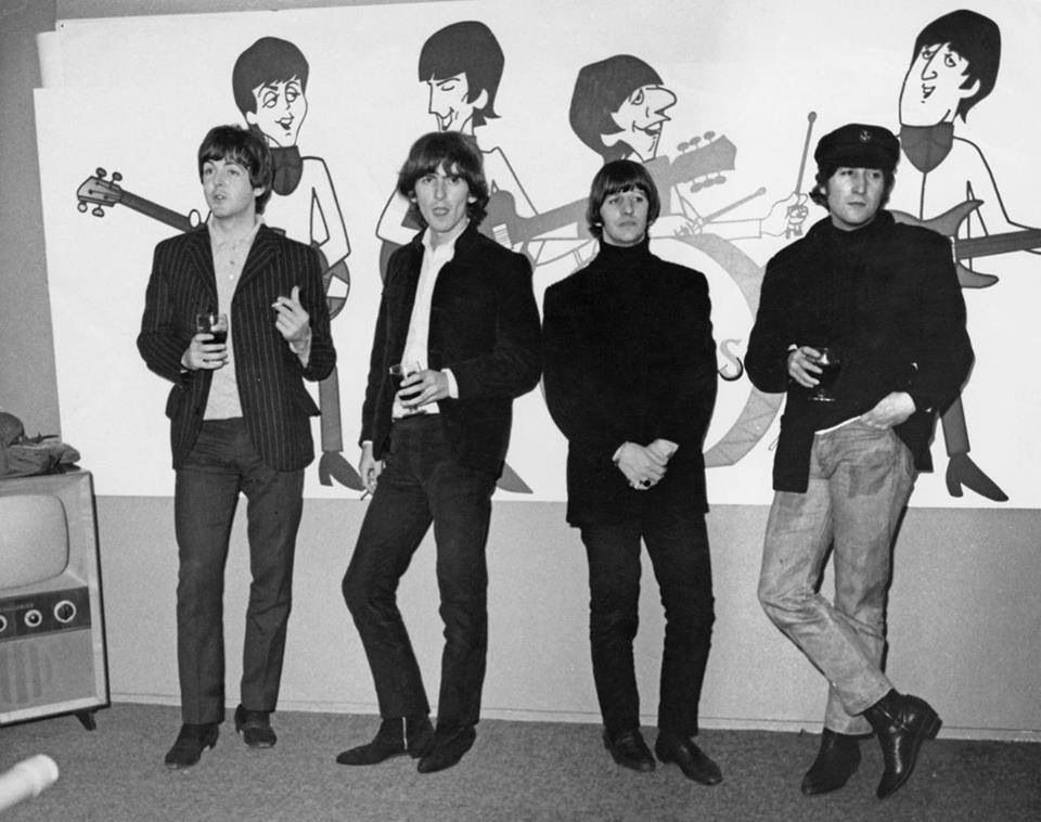 BeatlesArchive2's tweet photo. The #Beatles pose in front of animated cartoons of themselves in London on 11th November 1964. 
📷Mark and Colleen Hayward https://t.co/NO3jgbFjkq
