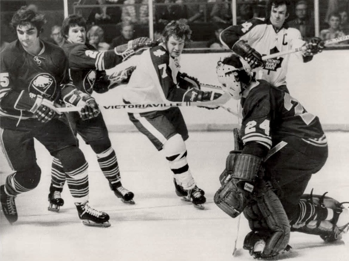 Berger_BYTES's tweet image. Incredibly rare photo of Lanny McDonald (7) in his first #NHL game - Oct. 10, 1973, vs. the #Sabres at Maple Leaf Gardens. It was the only game in which Lanny did not wear a helmet. He donned his to-be-familiar rounded head gear the following night, in #Philadelphia, and never