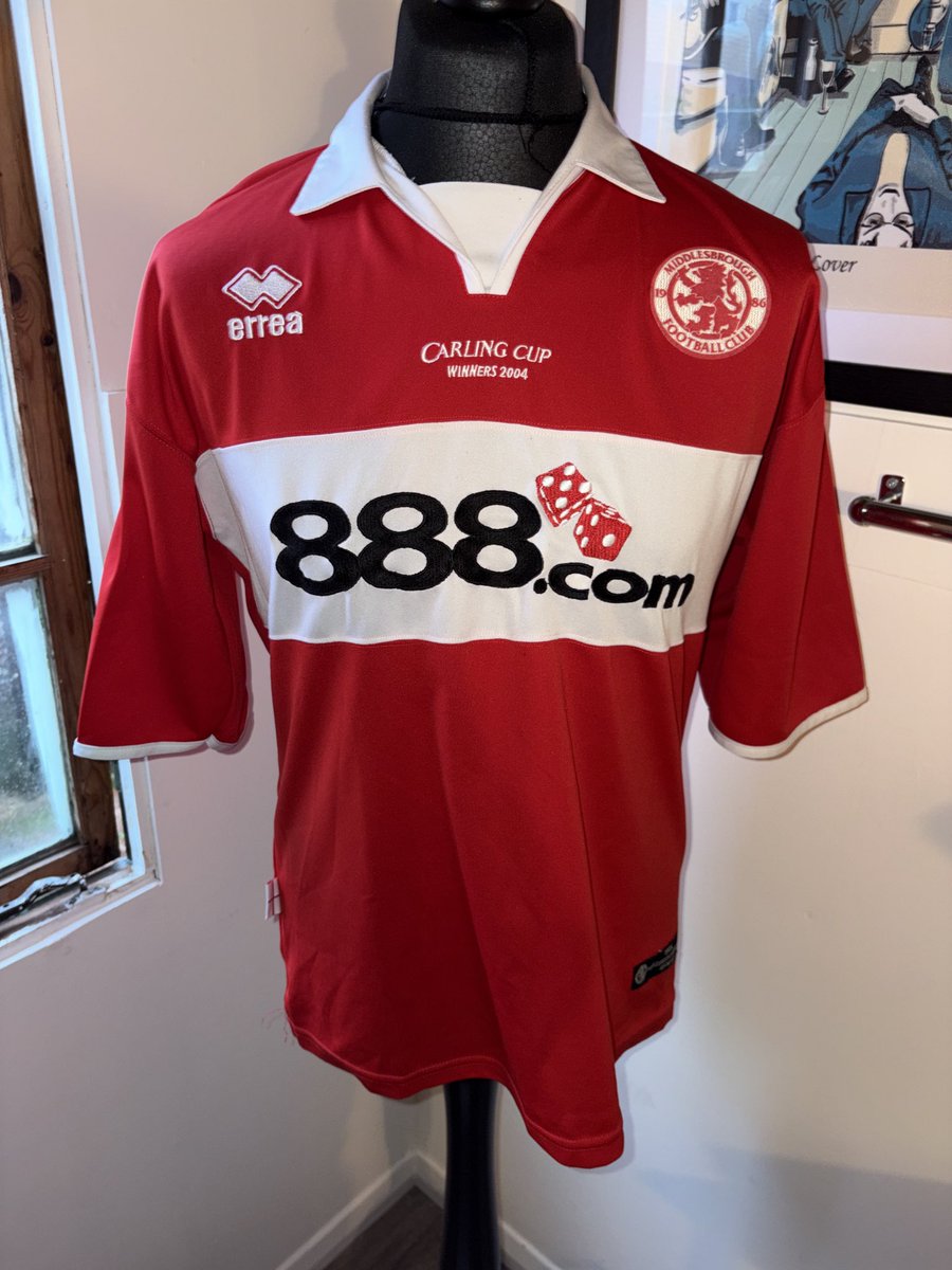 SFTPSP's tweet photo. Got quite a few shirts I’ve done I just haven’t posted so going to start going through the backlog. Today’s print is this Boro 2004-05 home shirt with Carling Cup winners stitching. Added Mark Viduka to this shirt alongside uefa cup patch to complete it nicely 😮‍💨 https://t.co/mWKyVjGpL2