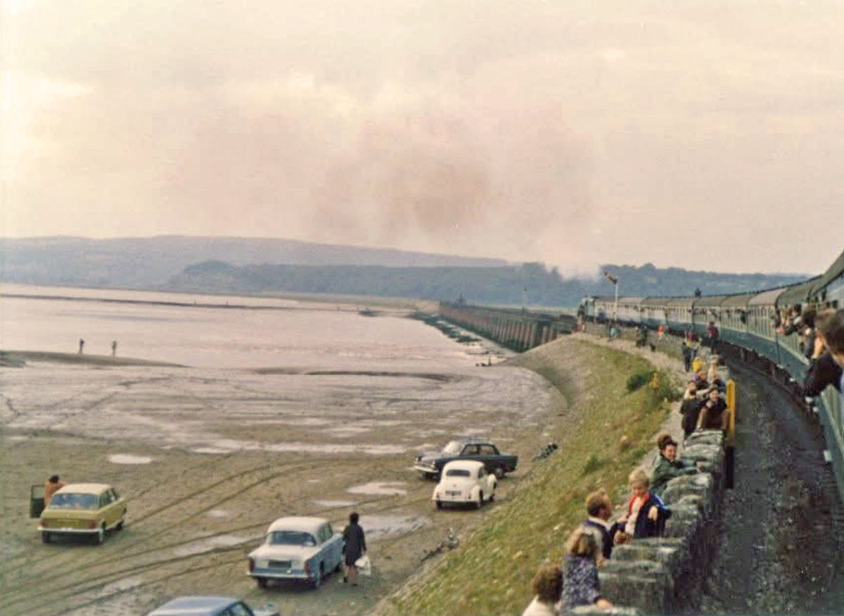 NowtbutaLad's tweet image. A steam special heads north across #Arnside Viaduct on the #Carnforth to Barrow line, 1972 [unknown photographer]. I believe that cars are no longer allowed on "the sands" / foreshore. @ArnsideCG  @railnigel #Railways