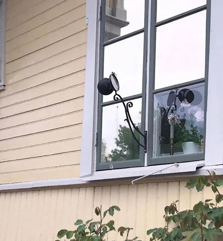 What are these little mirrors for? I spotted them all over the houses in Trosa, Sweden, near the river.