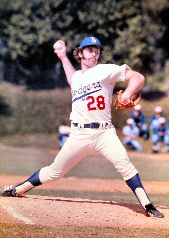 Mike Marshall pitching with the Dodgers. In 1974, he set a Major League record for most appearances by a relief pitcher, appearing in 106 games as he became the first reliever to win Cy Young.