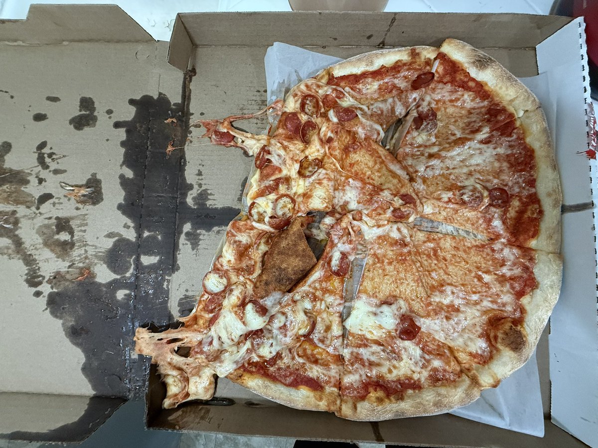 JeffyPoohWeller's tweet photo. Just ordered pizza via @DoorDash. The driver left it on my porch and I immediately went to get it, and this is what it looked like. Before I even picked it up I could see that half of the cheese was seeping out of the back of the box and sitting directly on my porch. Clearly this was from negligence of the driver, and it was very obvious even as he was putting it down he would’ve seen that half the box was soaking wet with grease and cheese was literally hanging out of the box. Contacted DoorDash and included pictures and they offered me a refund, for less than the amount of the pizza. Not to mention the fees they charged and the tip I already gave the driver since they asked for a tip ahead of time. Disgusting company, disgusting excuse for a human being of a driver. Never again.
@DoorDash_Help #doordash