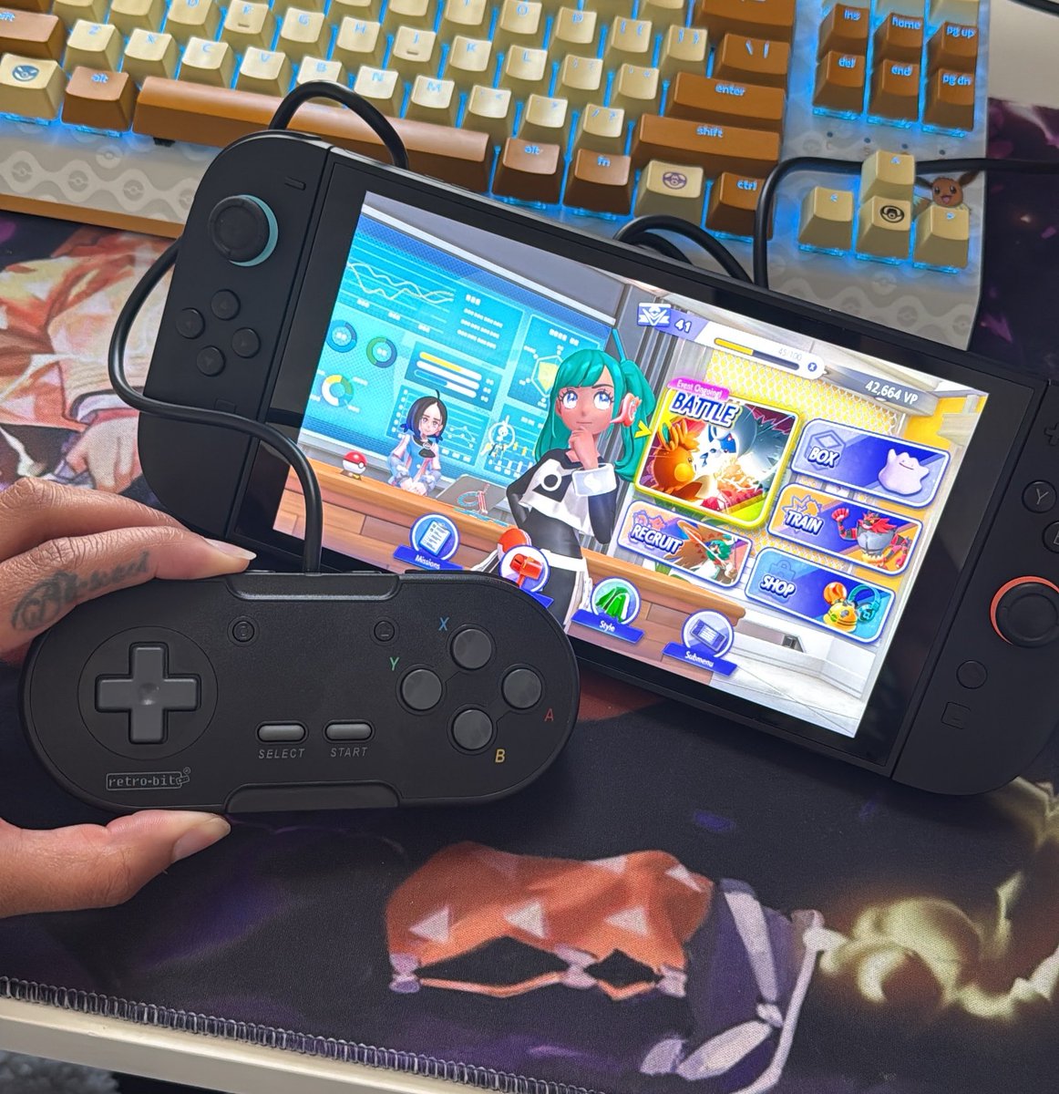 beccabaddest's tweet photo. I’m not sure anyone else experienced this w/ Champions, but I felt a noticeable lag when using my joycon to select moves. I’ve misclicked in battles (a water move on my own Arcanine 🥹) so I said F it &amp; got this old style controller to force using the Dpad. Def helped 👍🏽 https://t.co/wIObYaceBt