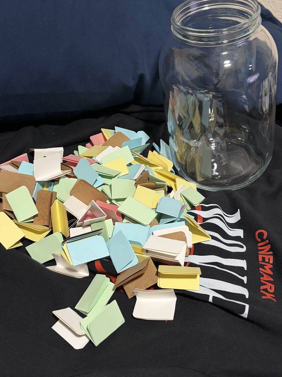 jobening's tweet image. wrote down all movies onto different colored cards based on genre

pick a random movie from jar. add it to “watched” jar. repeat.

#physicalmedia #moviecollection