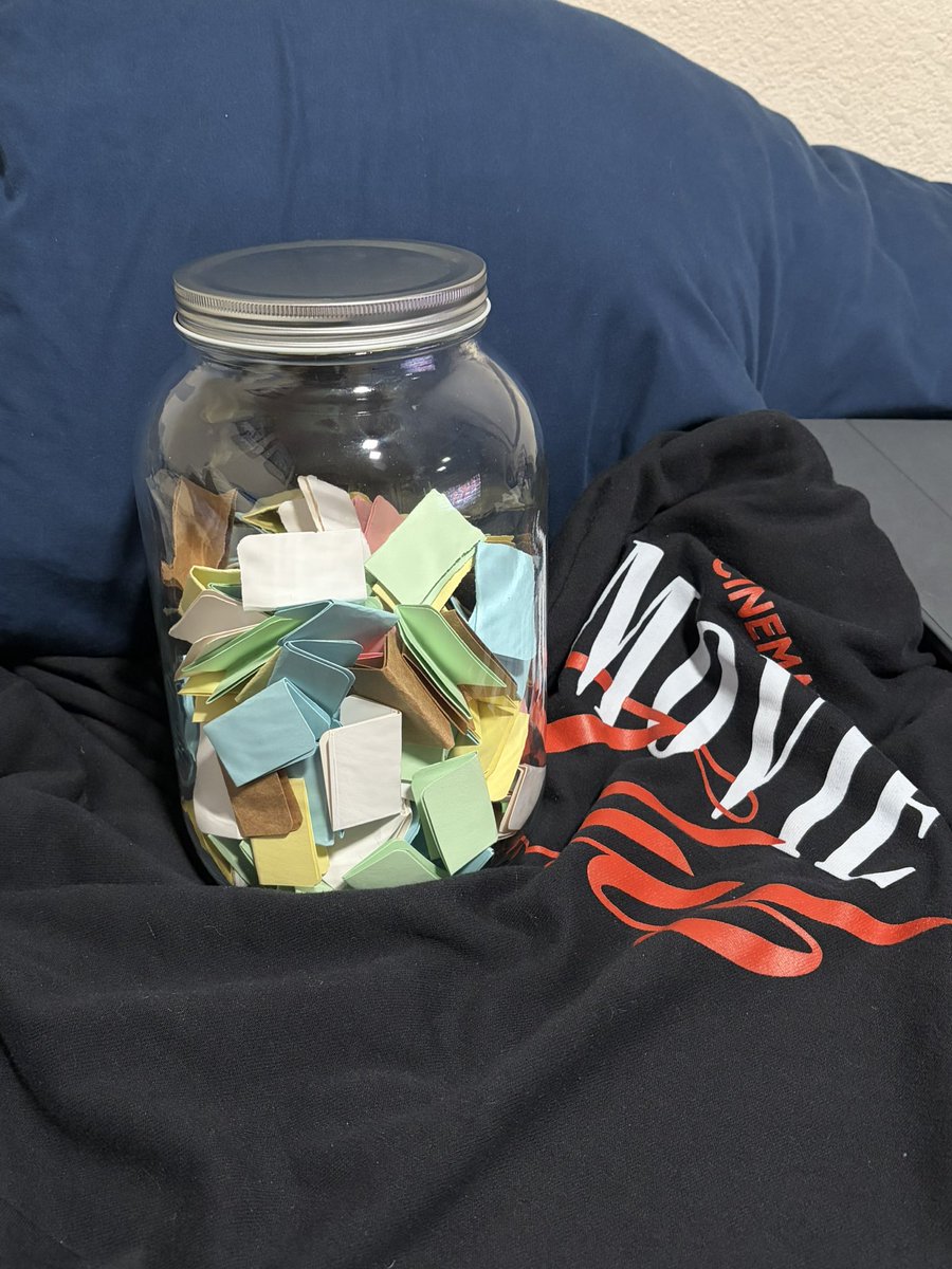 jobening's tweet image. wrote down all movies onto different colored cards based on genre

pick a random movie from jar. add it to “watched” jar. repeat.

#physicalmedia #moviecollection