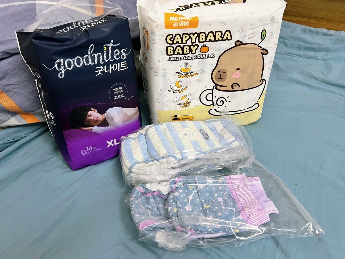 powered_mo's tweet photo. 新的纸尿裤终于到货了，尝试一下goodnites
还有蜜嘟嘟的新款 。gn老板还挺好的多送了一片XL的试用装。开心

#abdl #abdlboy #Diaper #diaperu #goodnites #おむつ #纸尿裤 #尿不湿 https://t.co/qO64SWhG5P