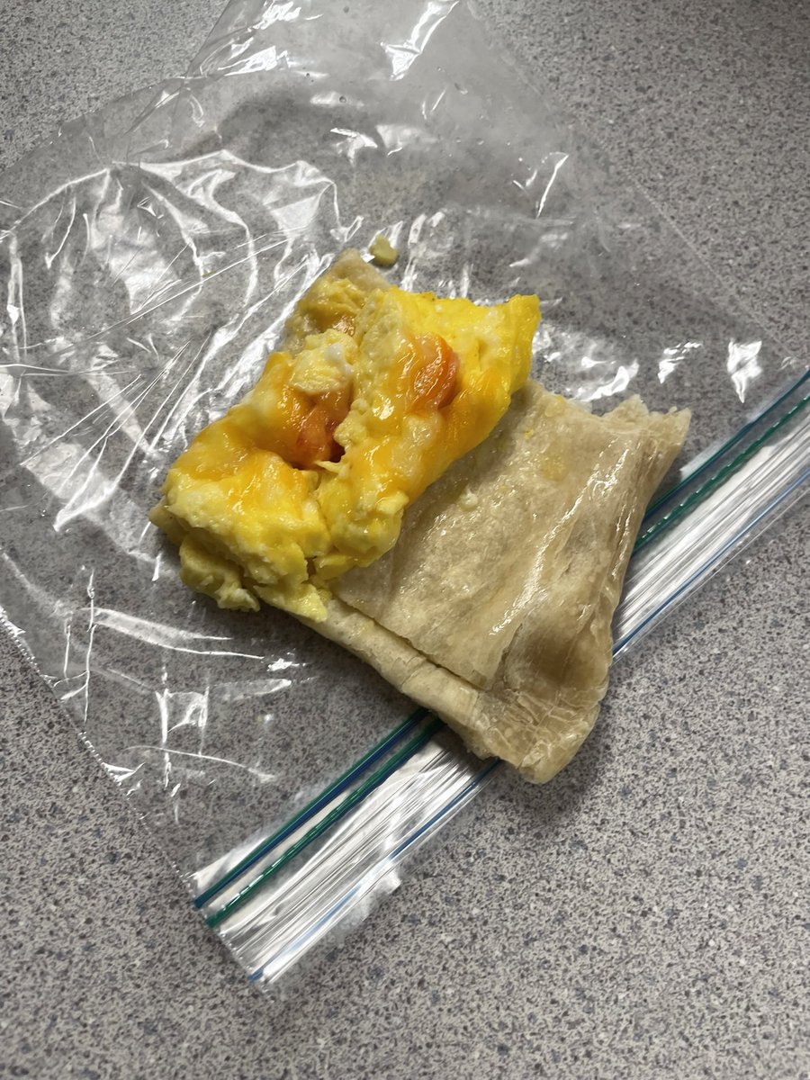 realyfeunicorn's tweet image. my friend randomly handed me a “breakfast pizza” in the hallway and insisted that i try it. meal inspo? 😄💕